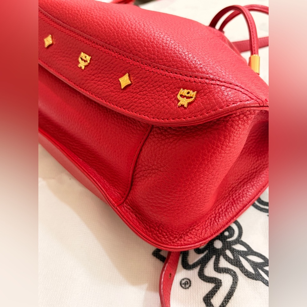 MCM Red Leather Bucket Bag
Crossbody Drawstring Gold Hardware - Picture 11 of 17